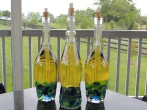 tiki torch made from wine bottles